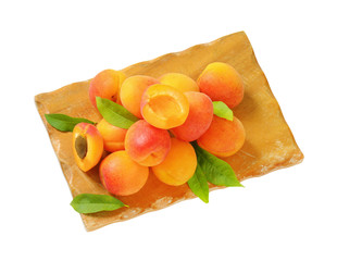 ripe apricots with leaves