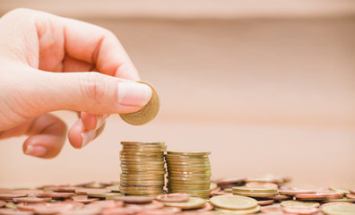 Pictures of Asian currencies are placed as layers,Focus on hands