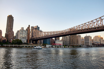 Fototapeta na wymiar Queensboro bridge entering Manhattan Midtown East between the skyscrapers