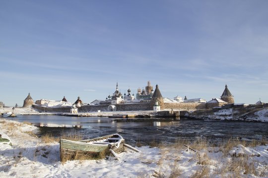 Boat on the background of the Solovetsky monastery