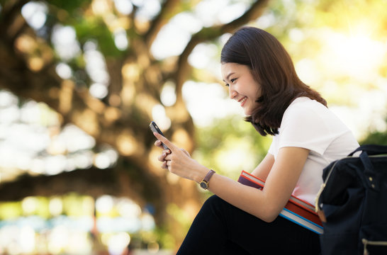 Asian Lady Relax With Mobile Smart Phone