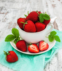 Cup with fresh strawberries