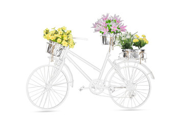 Fototapeta na wymiar White bike on the seat and basket flowers isolated white background.