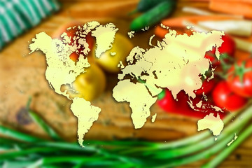 World map on vegetables and fruits background