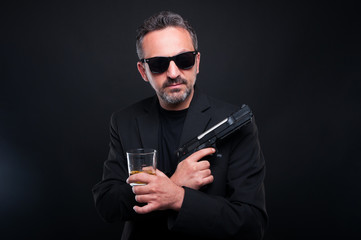 Dangerous mafia boss drinking scotch