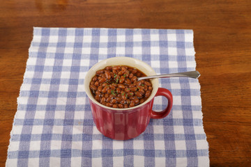 Baked Beans in Red Mug with Spoon