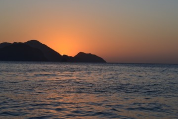 Naklejka na ściany i meble Sunset during El Nido Island Hopping