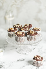 Chocolate muffins with banana and tea