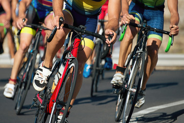 Plakat Cycling competition,cyclist athletes riding a race at high speed