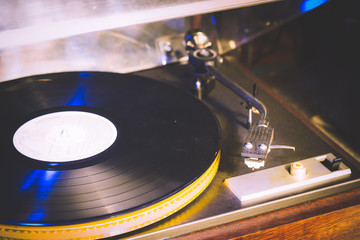 Close up at vintage gramophone. playing old song,Vintage record player with vinyl disc