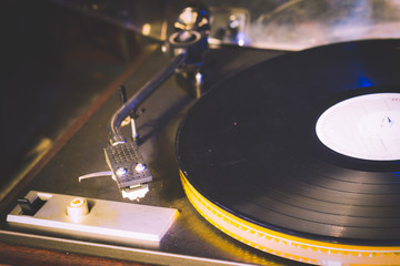 Close up at vintage gramophone. playing old song,Vintage record player with vinyl disc