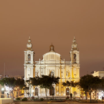Parish Church in Msida illuminated at night, Malta