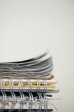 Close up of three sketchbooks