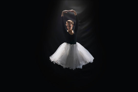 Ballerina on black background