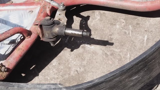 View of broken hub of karting car.