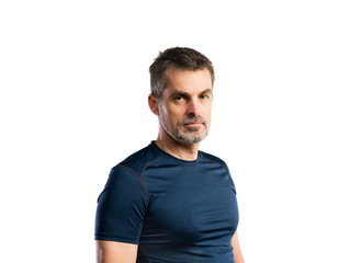 Obraz premium Mature hipster man in blue t-shirt. Studio shot, isolated.