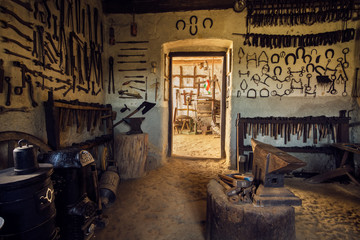 Obraz na płótnie Canvas Traditional smithy workshop interior