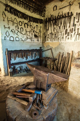 Fototapeta na wymiar Traditional smithy workshop interior