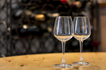 Empty wine glasses on a wooden plank
