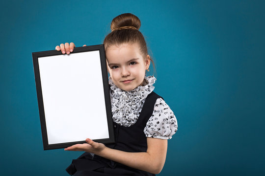 Little Child With Papers Dressed Like Teacher