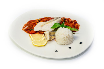 Fish dish - fried fish fillet white rice and vegetables