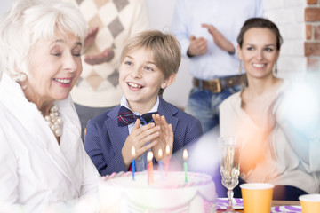 Family celebrating grandma's birthday