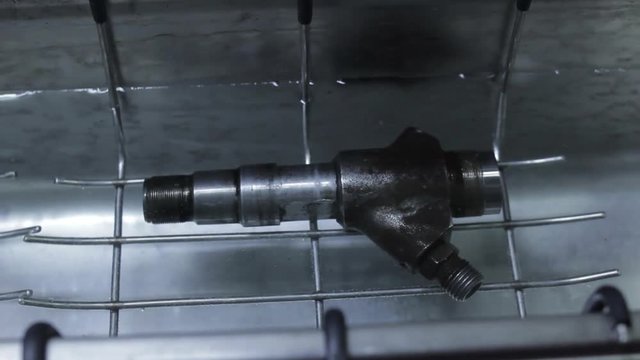 diesel injector cleaning in an ultrasonic bath