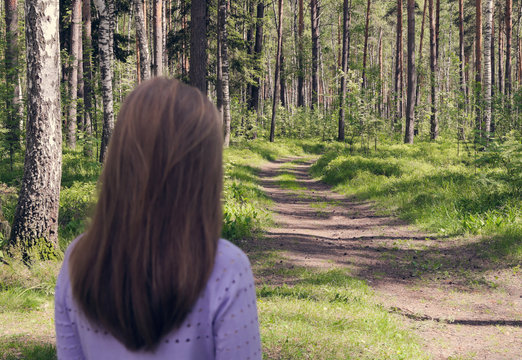 The girl is looking at a beautiful forest. Instagram