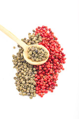 Green and Red Pepper in White Background Wood Spoon