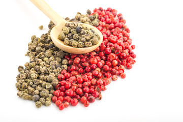 Green and Red Pepper in White Background Wood Spoon