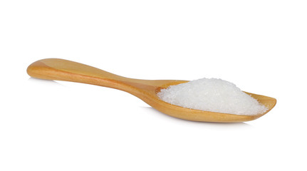 MonosodiumGlutamate (MSG or E621) on wooden spoon isolated on white background.