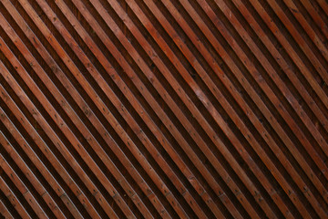 Faded wooden planked grid fence texture background. Vintage effect.