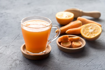 Fresh-squeezed carrot juice Healthy carrot juice Glass of tasty vegetables juice Detox juice