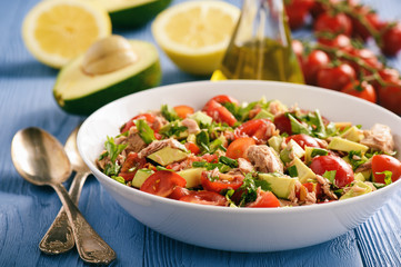 Healthy salad with tuna,cherry tomatoes and avocado.