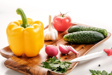 Vegetable salad, vegetarian, pepper, radish, tomato, celery, knife, white background