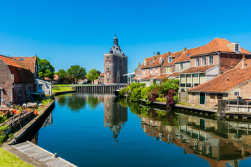Fototapeta na wymiar Houses along canal in Enkhuizen Netherlands