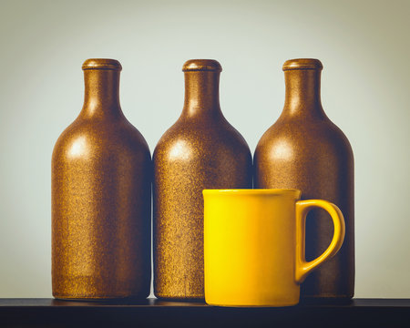 Ceramic bottles and a cup