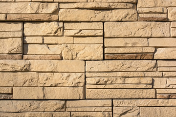 Flat rocks layered to form a solid wall