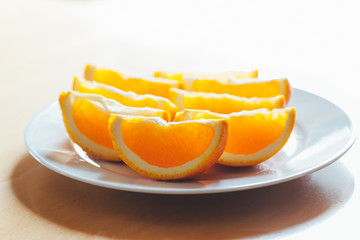 fresh orange slices on a plate