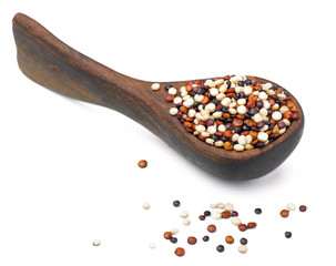 uncooked quinoa seeds isolated on white, (large depth of field, taken with tilt shift lens)