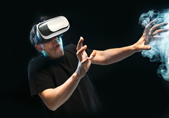 Obraz na płótnie Canvas The man with glasses of virtual reality. Future technology concept.