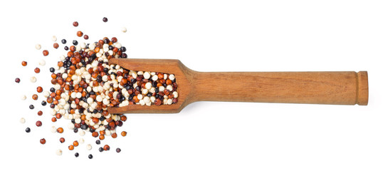 Obraz premium uncooked quinoa seeds isolated on white, top view