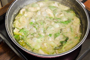 Thai food cooking, Green curry cooking in pan
