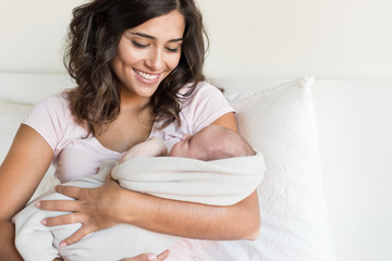 Mother holding newborn baby