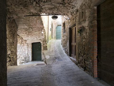 Italian old village street, scene. With Madonna shrine.