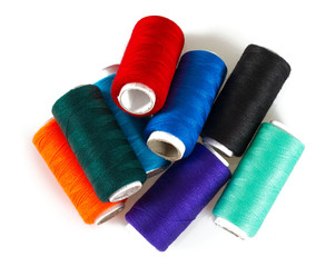 colorful sewing thread isolated on white