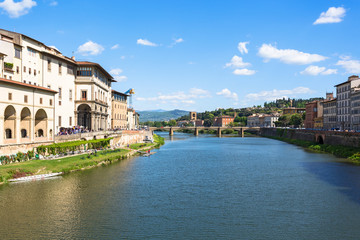 Fototapeta na wymiar Old buildings by the Arno River in Florence