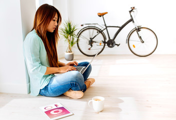 korean girl working with laptop