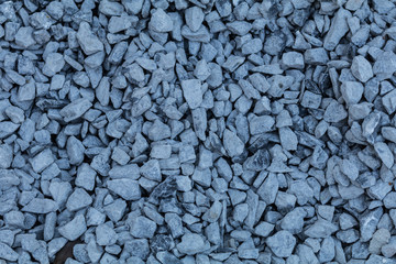 Pile of blue construction granite rock