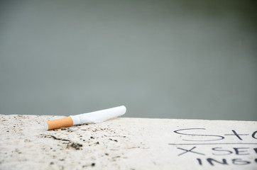 cigarette on the wall